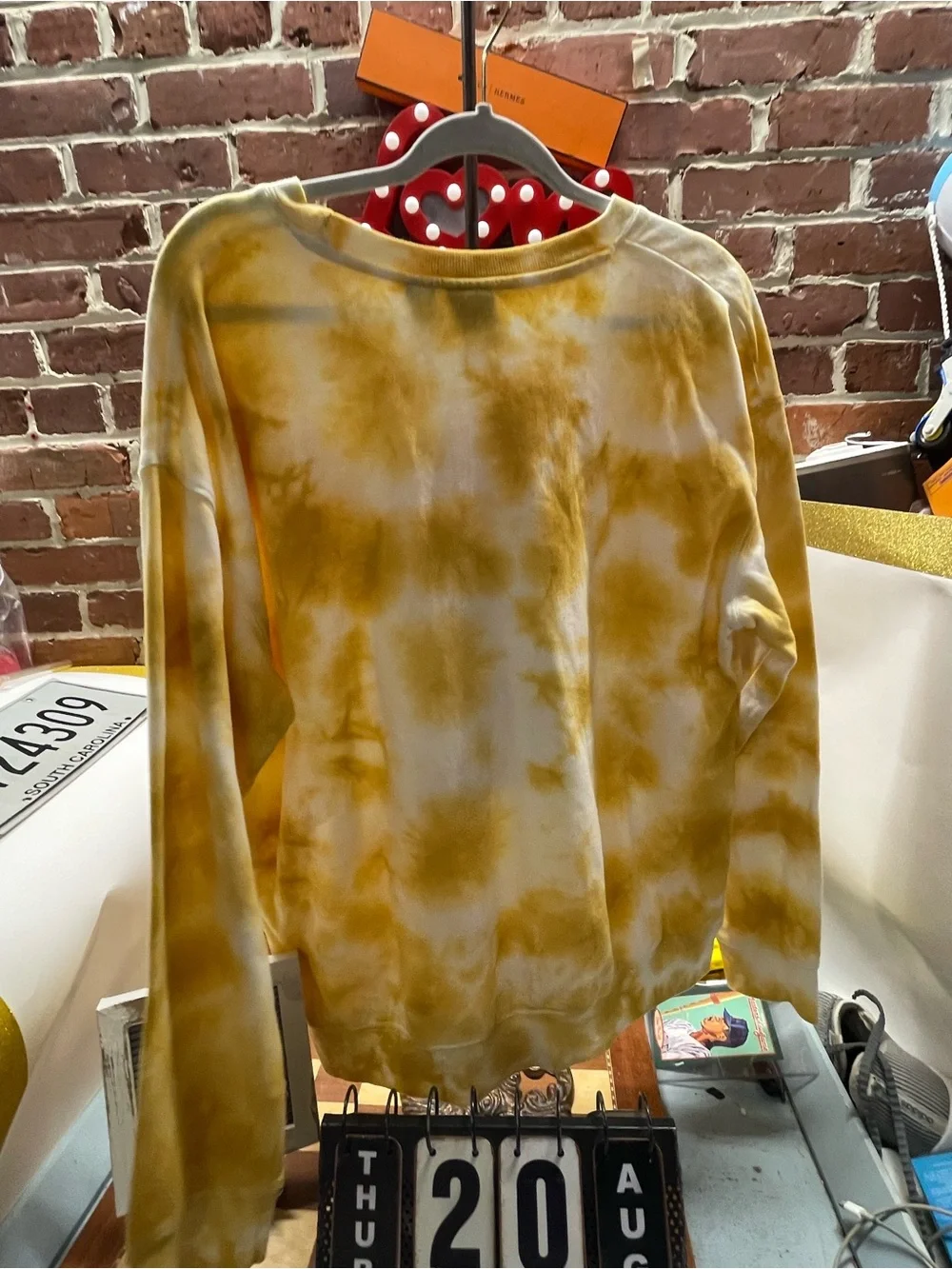 yellow and white tie-dye Star Wars crewneck sweatshirt featuring a retro graphic